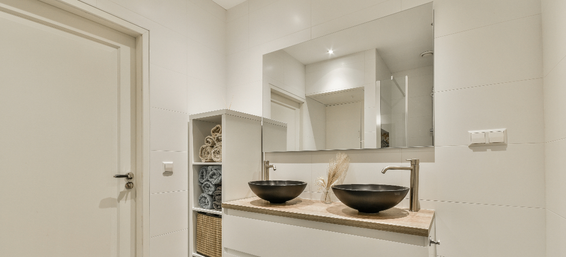 bathroom mirror and storage cabinet