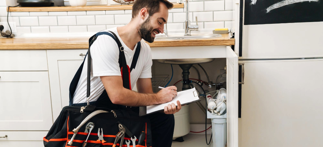 licensed plumber with equipment