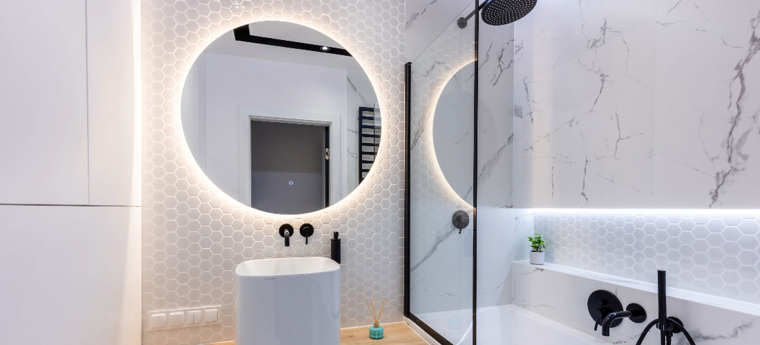 modern small bathroom with mirror lighting