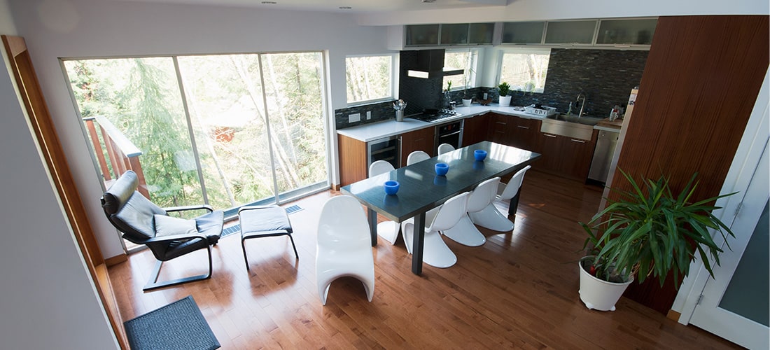 Open plan modern kitchen with luxury laminate flooring.